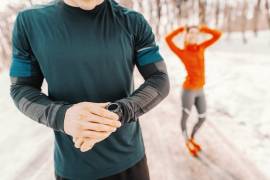 How much should I reduce my training by during the triathlon off-season?