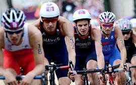 What is a domestique in triathlon?