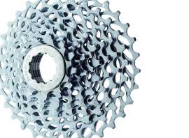 What are the advantages of a triple crankset with a standard cassette?