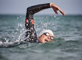How much should you reach in front crawl?