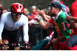 How much does it cost to enter and race an Ironman?