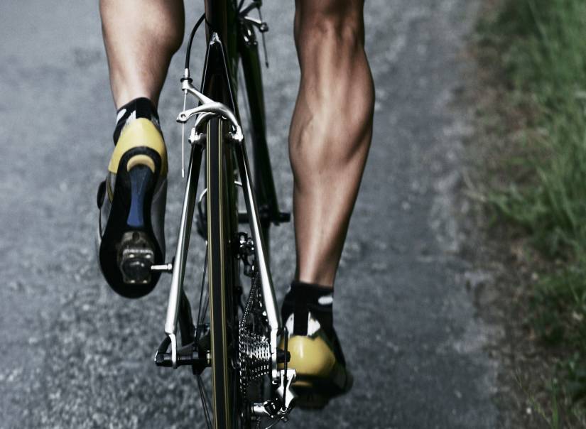 How can I prevent calf muscle cramp towards the end of the bike leg?