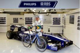 Rubens Barichello rides on a Storck E-Bike at his 300th Grand Prix