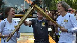 Sarah Springman carries Olympic Flame
