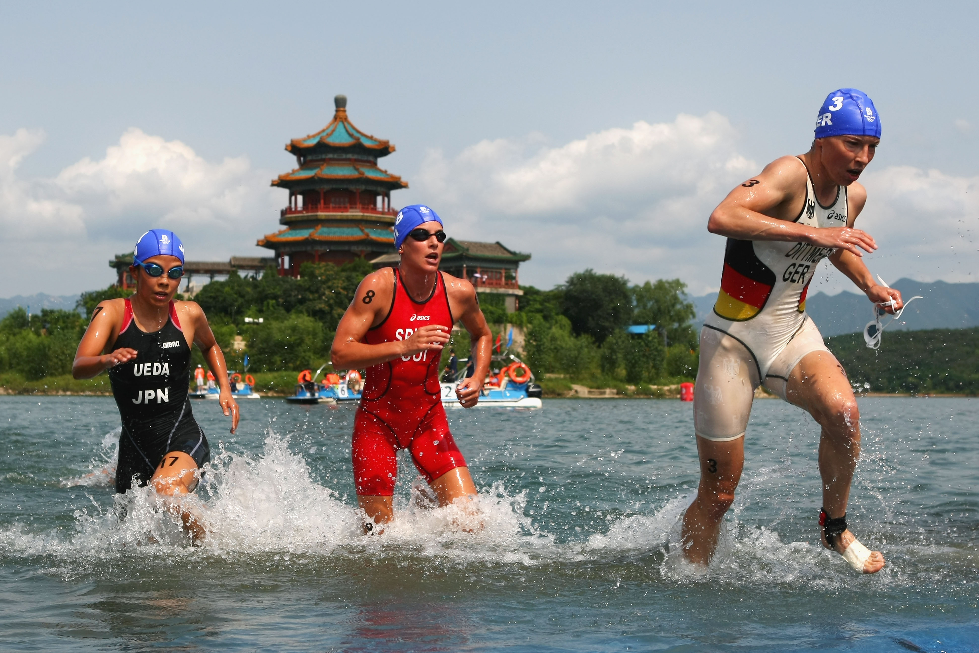 Olympics Day 10 - Triathlon A young Spirig wades out the water at the 2008 Beijing Olympics Games / Getty Images