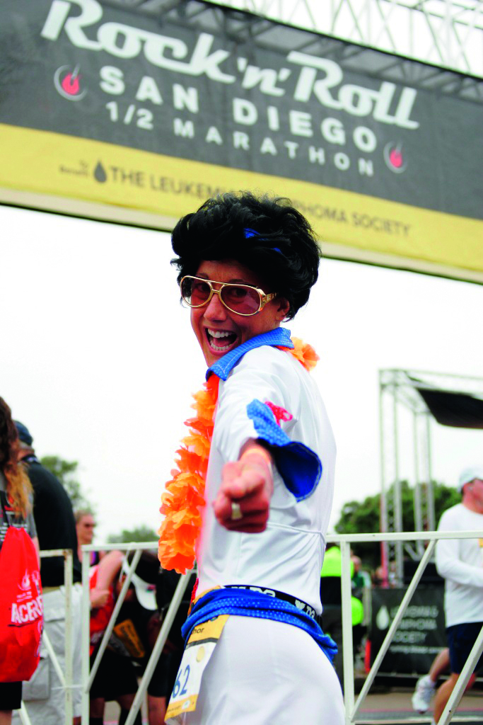 SAN DIEGO, CA - JUNE 03: 3-time Ironman World Champion Chrissie SAN DIEGO, CA - JUNE 03: 3-time Ironman World Champion Chrissie Wellington celebrates at the finish line after running in the Rock 'n' Roll Half Marathon on June 3, 2012 in San Diego, California. (Photo by Kent C. Horner/Getty Images) *** Local Caption *** Chrissie Wellington
