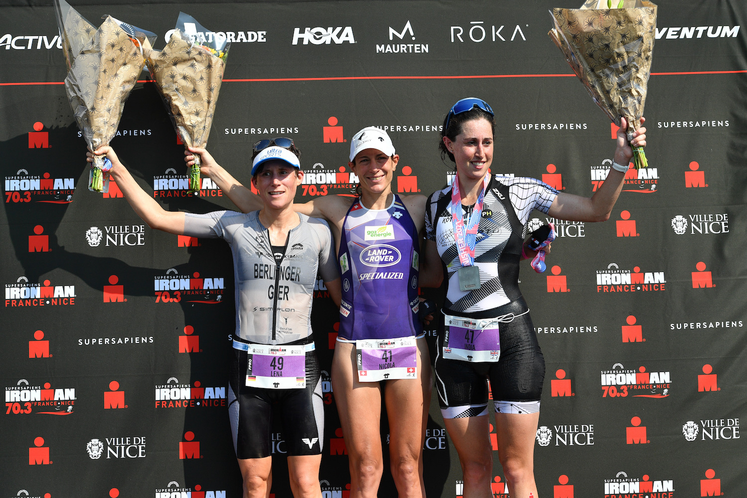 Supersapiens IRONMAN 70.3 Nice NICE, FRANCE - SEPTEMBER 12: (L-R) Lena Berlinger of Germany (2nd), Nicola Spirig of Switzerland (1st) and India Lee of Great Britain (3rd) cheer after competing in the Supersapiens IRONMAN 70.3 Nice on September 12, 2021 in Nice, France. (Photo by Alexander Koerner/Getty Images for IRONMAN)