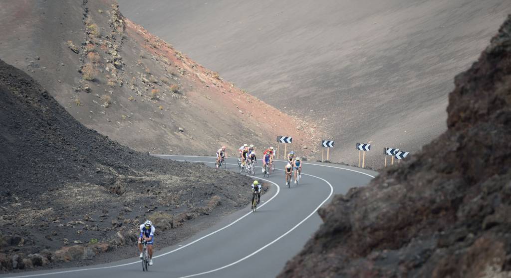 athletes cycling during ironman lanzarote