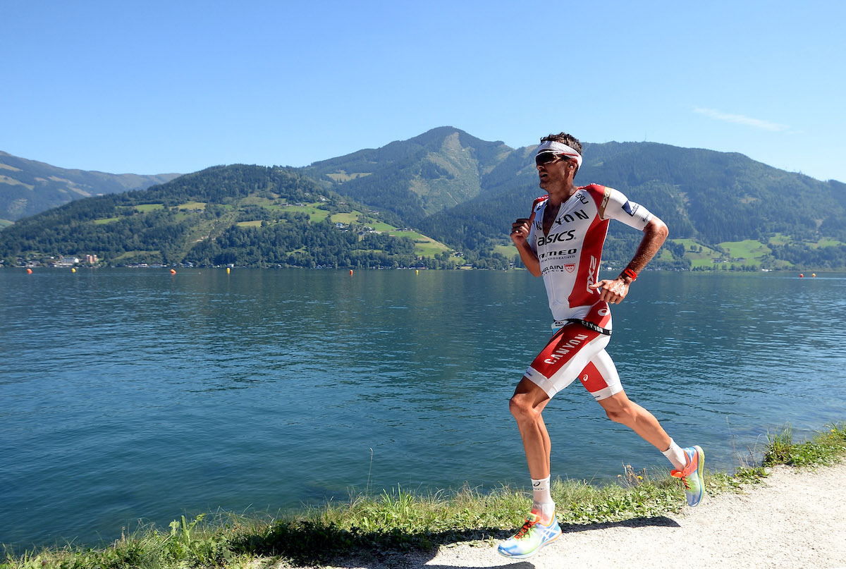 Jan Frodeno running alongside the lake route to winning the 2015 Ironman 70.3 Worlds, in Zell am
See-Kaprun, Austria.