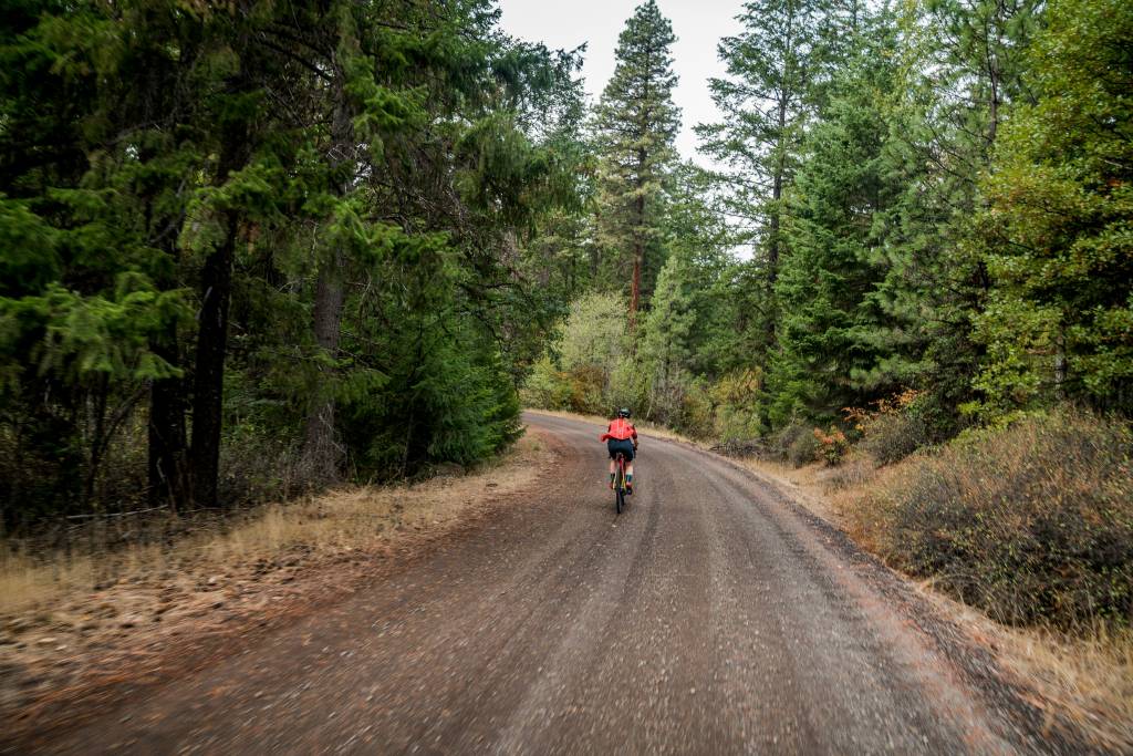 gravel cyclist on a wide open road