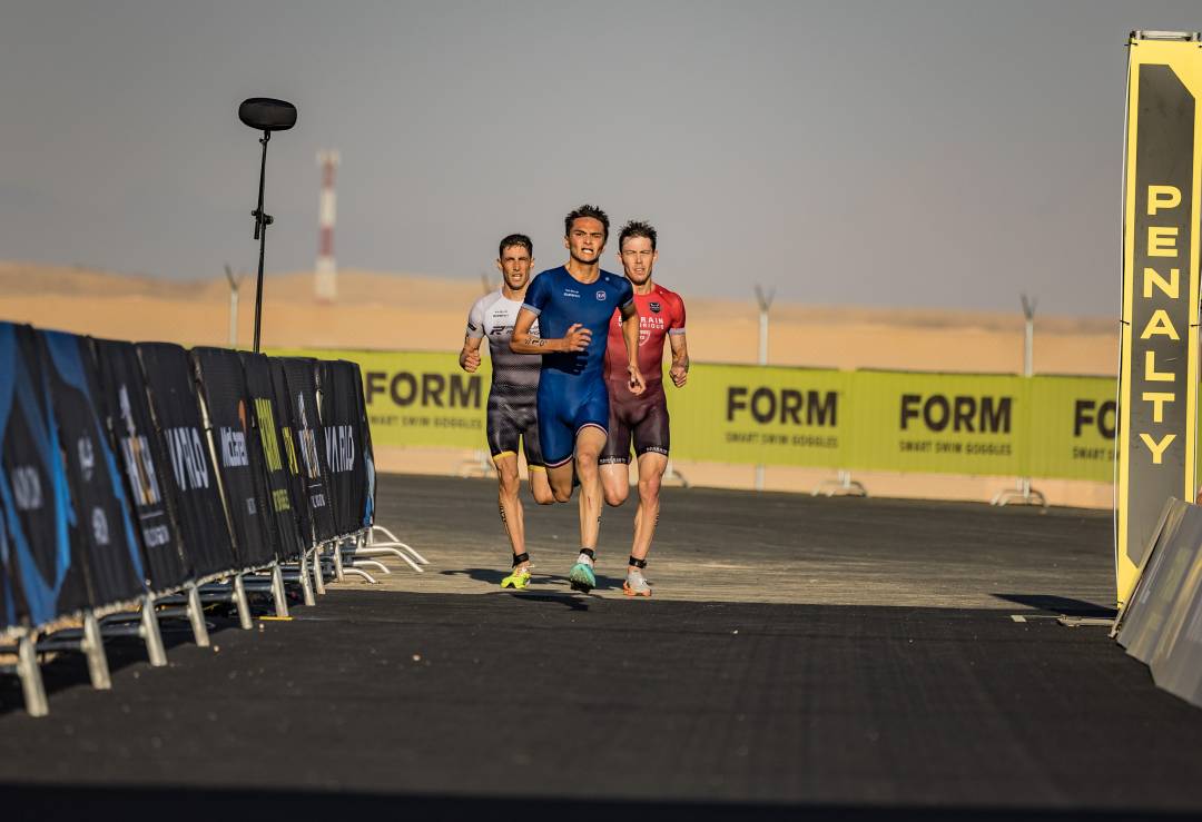 Alex Yee leads Hayden Wilde and Leo Bergere in a sprint for the line in Neom, Saudi Arabia. Pic credit: That Cameraman