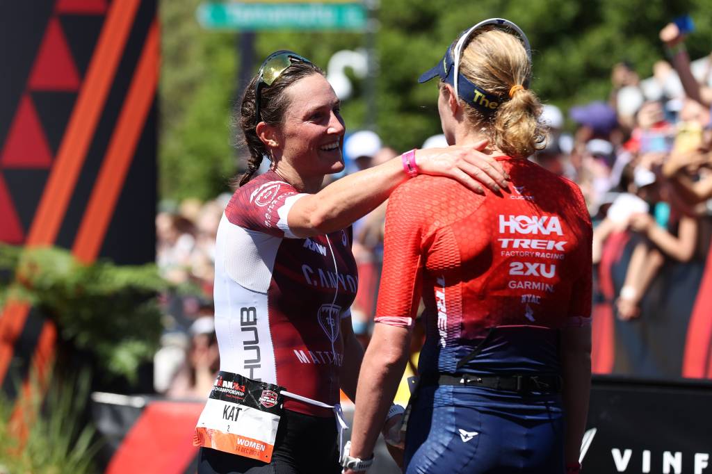 Kat Matthews congratulates Taylor Knibb on winning the Ironman 70.3 world title in Taupo, New Zealand. Pic credit: Fiona Goodall/Getty Images for IRONMAN