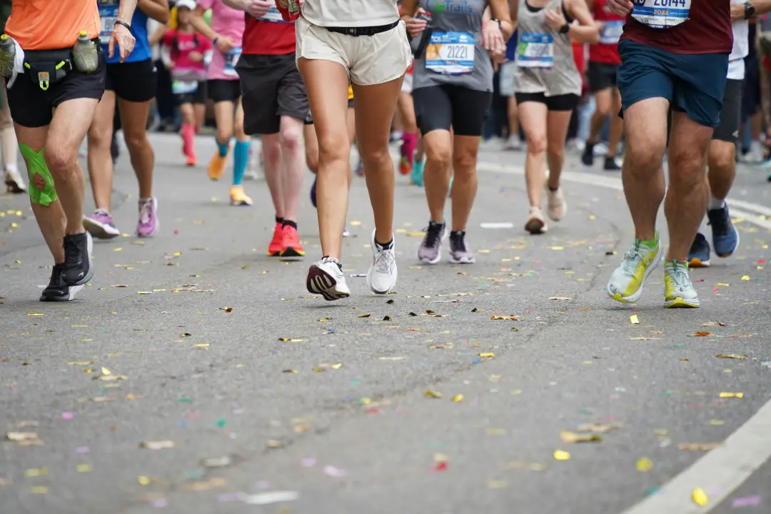 runners in a road race, close-up on their shorts