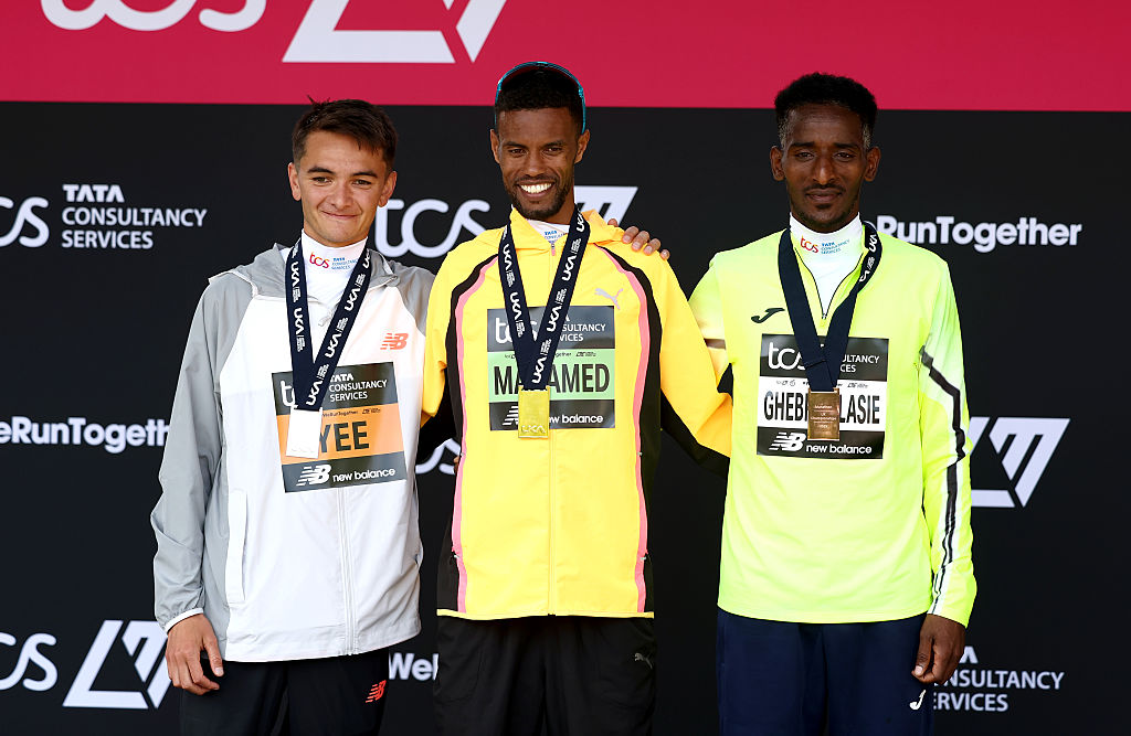 LONDON, ENGLAND - APRIL 27: First placed British athlete Mahamed Mahamed (C), second placed Alex Yee of Team Great Britain (L) and third placed Weynay Ghebresilase of Team Great Britain (R) pose for a photo on the podium after the Men's 2025 TCS London Marathon on April 27, 2025 in London, England.