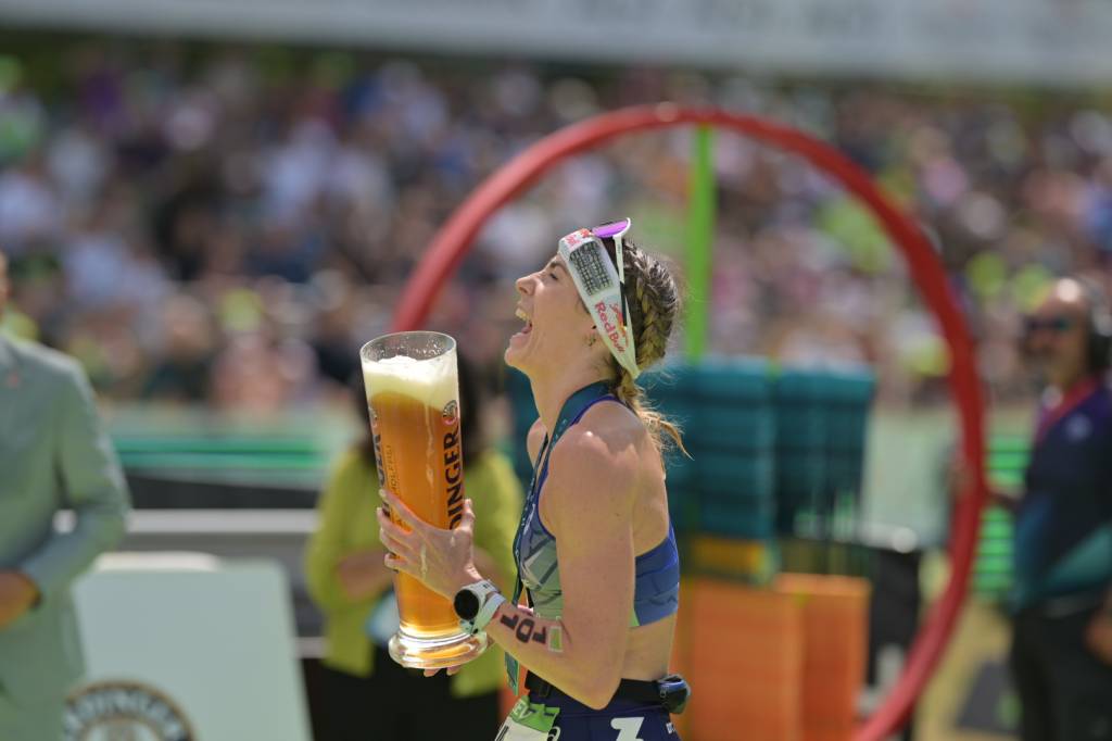 Lucy Charles-Barclay celebrating second place at Challenge Roth 2026.