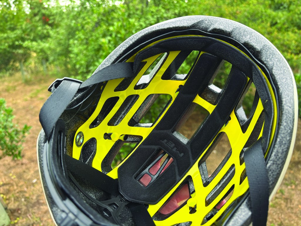 Inside of road bike helmet showing foam, padding and straps
