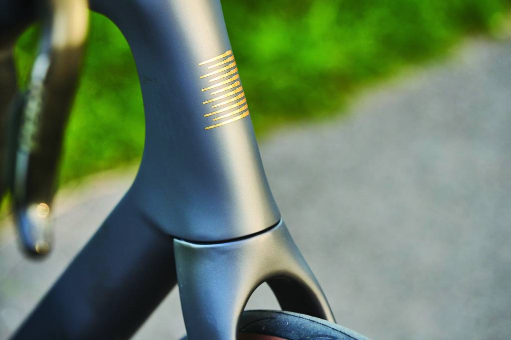 Head tube of grey road bike