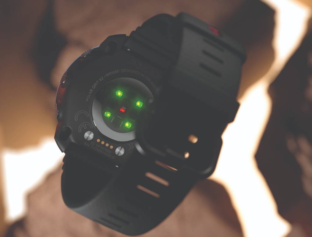 Back of multisport watch showing green LED lights