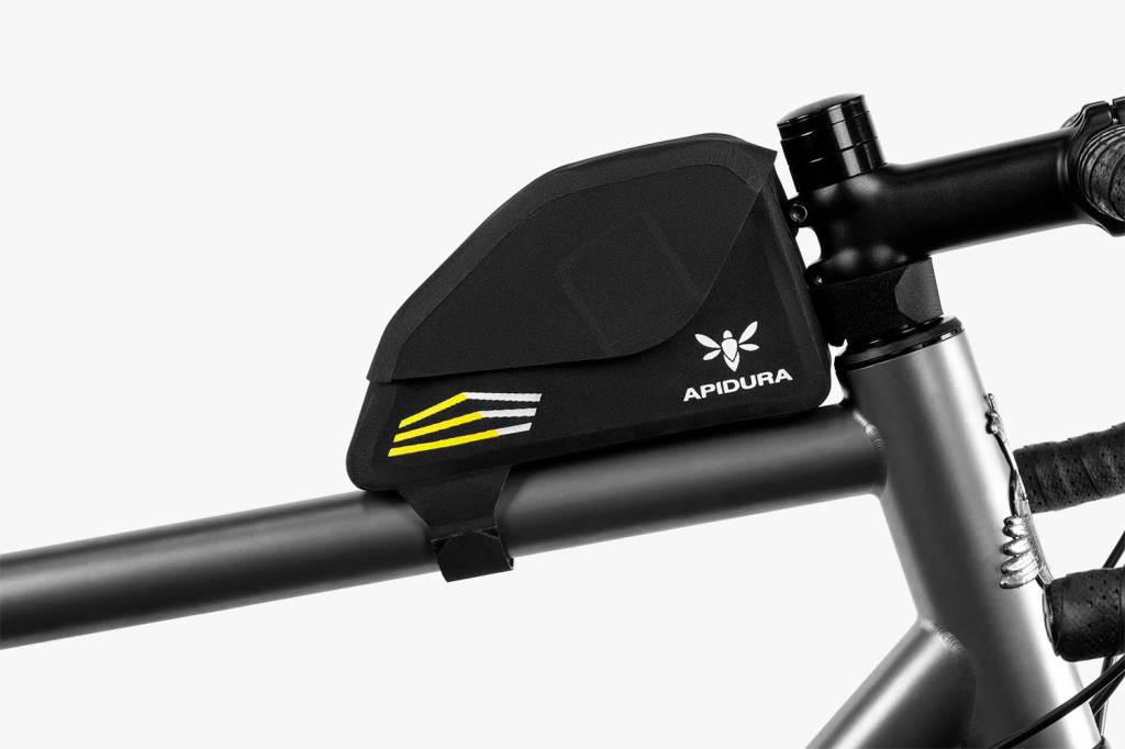 Black and yellow top tube bag attached to bike frame