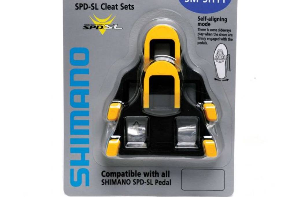 Package of yellow road cycling cleats