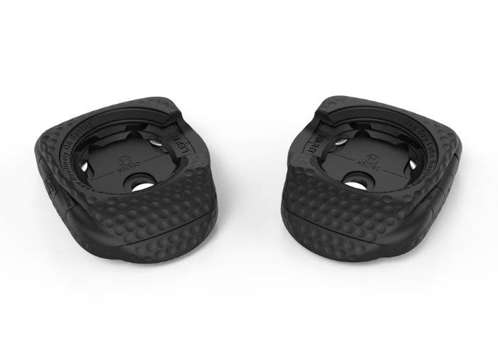 Black road cycling cleats on white background