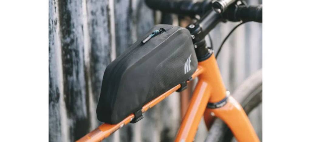Black top tube bag on orange frame