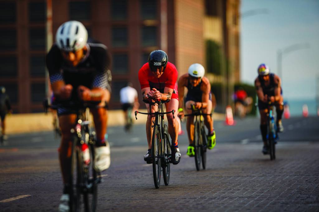 CHICAGO, ILLINOIS / UNITED STATES - 25 AUGUST 2019: Aaron Seipel (2020) competes in the Chicago Triathlon. For over 30 years, triathletes have gathered for one of the largest triathlons in the world.