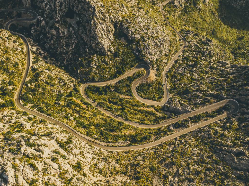 Aerial view of a serpentine mountain road