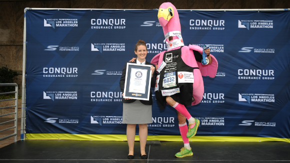 Fastest man dressed as a bird to complete a marathon