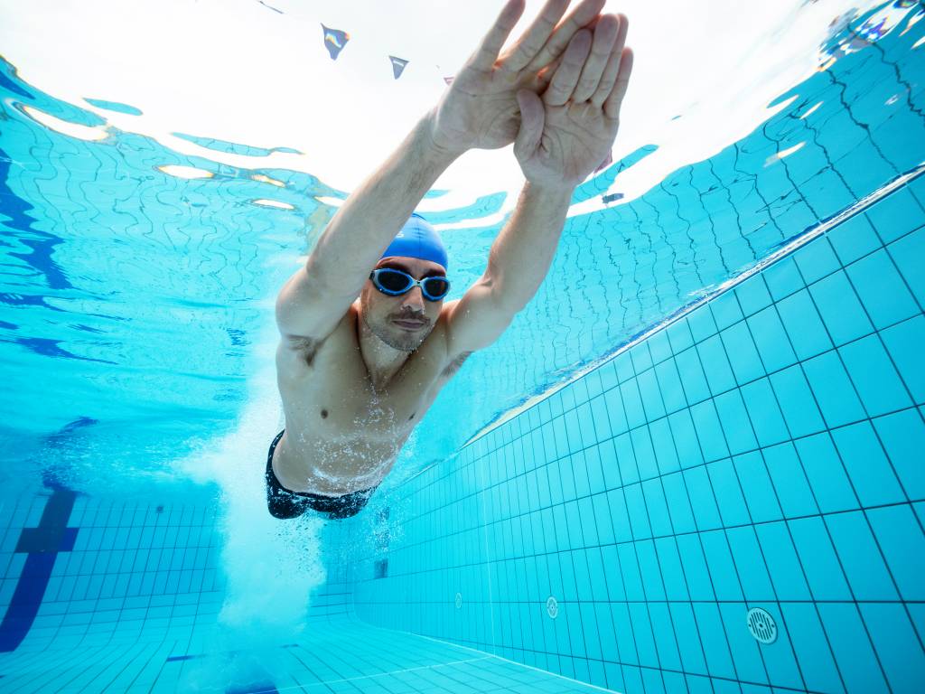 man swimming through water Captured at Cabaritta on 14Feb, 2025 by Matt Horspool at Etchd Photography.
