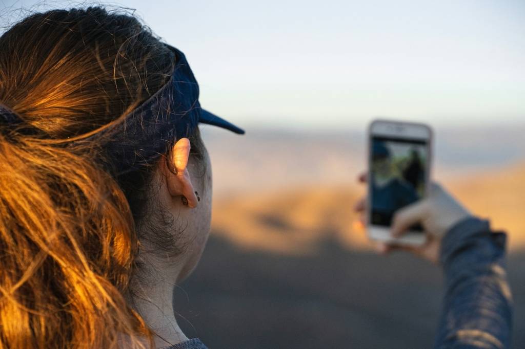 Close-up of a female runner taking a selfie