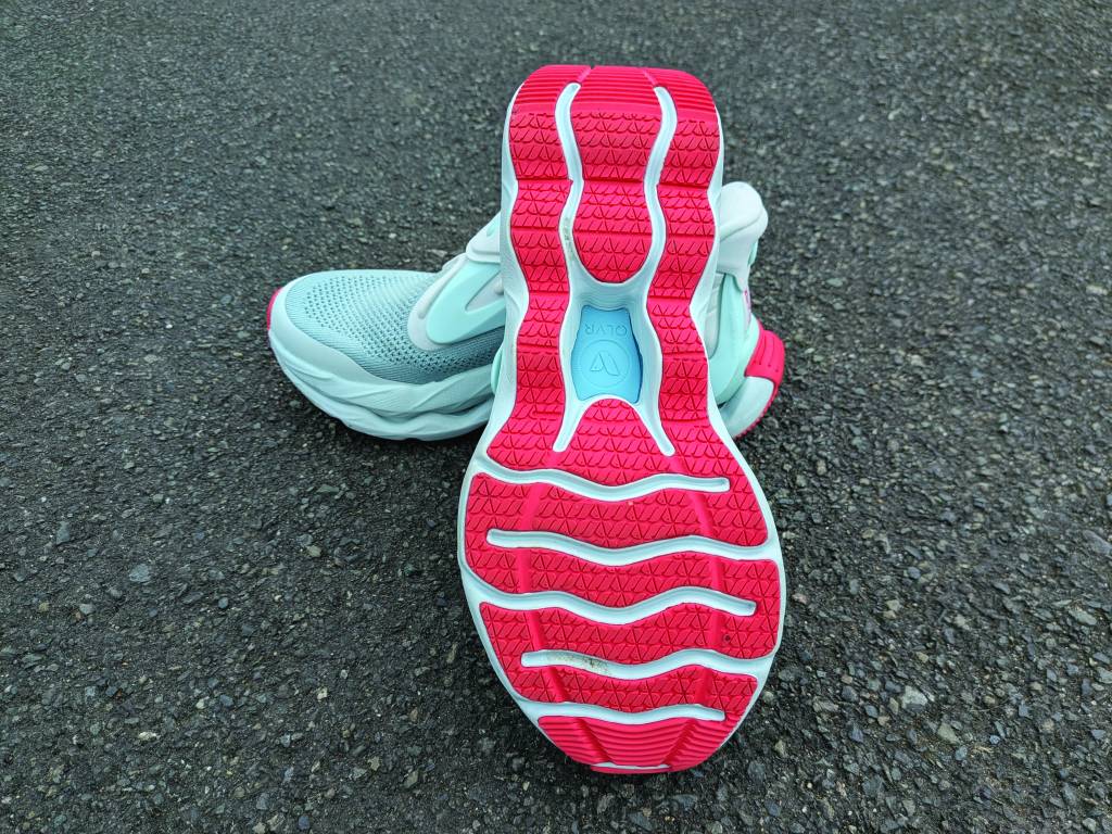 Sole of blue and red running shoe