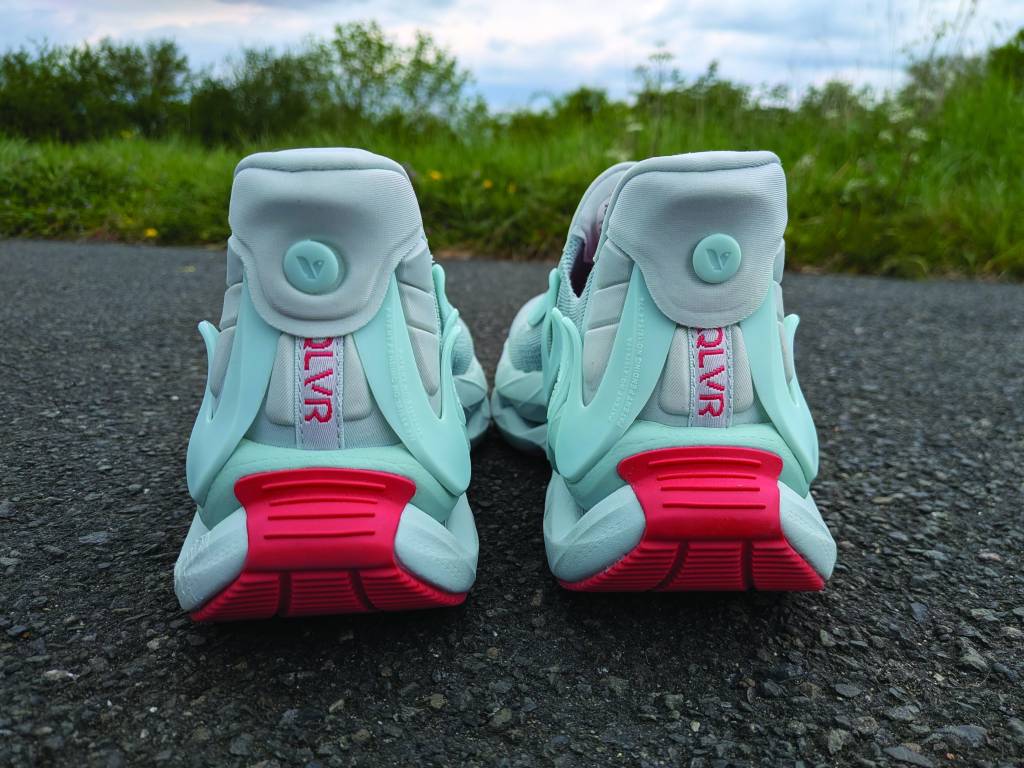 Heel of blue and red running shoes