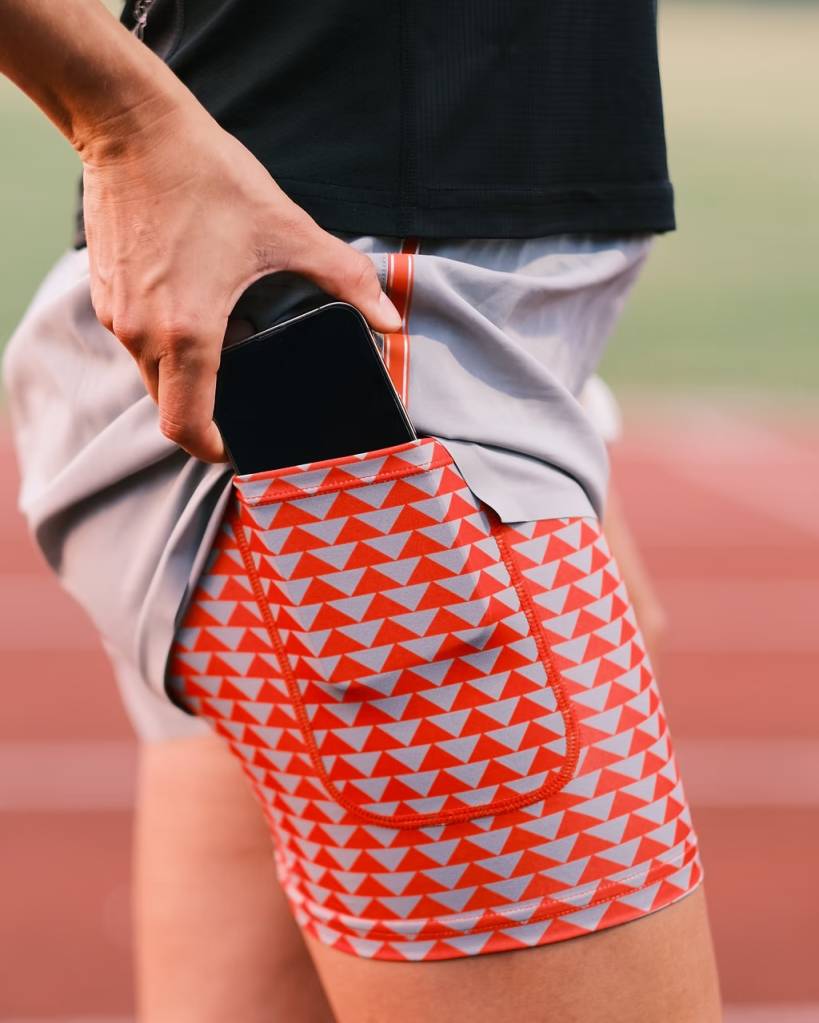 A woman wearing Sealskinz running shorts