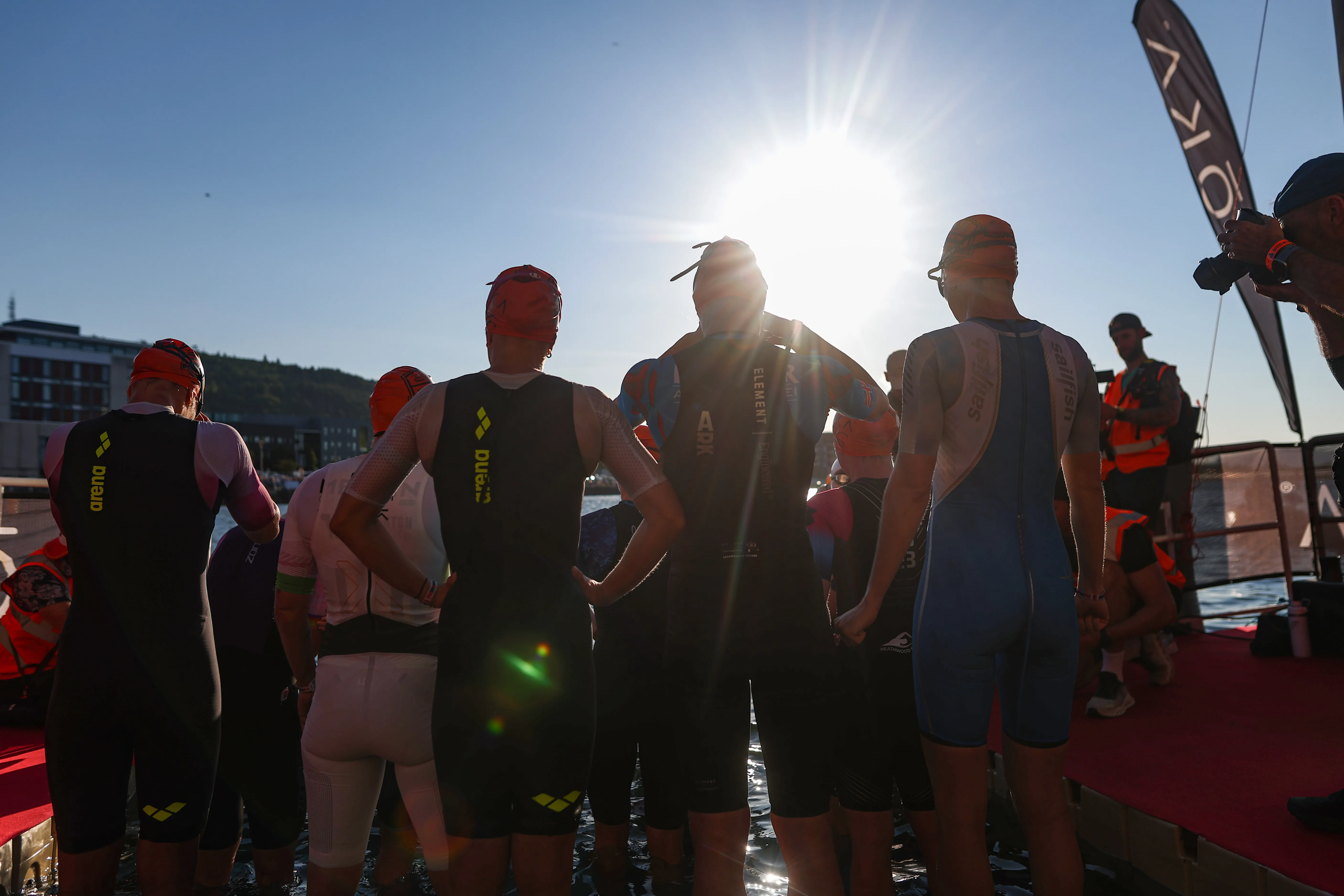 Scorching performances from GBR’s Harry Palmer and Lizzie Rayner as they win a non-wetsuit Ironman 70.3 Swansea race