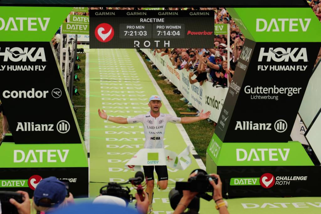 Sam Laidlow crossing the finish line at Challenge Roth 2026 after breaking the iron-distance record